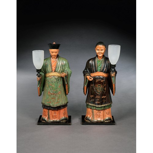 A PAIR OF REGENCY POLYCHROME DECORATED FIGURES OF A MANDARIN AND HIS CONSORT MOUNTED WITH LAMPS